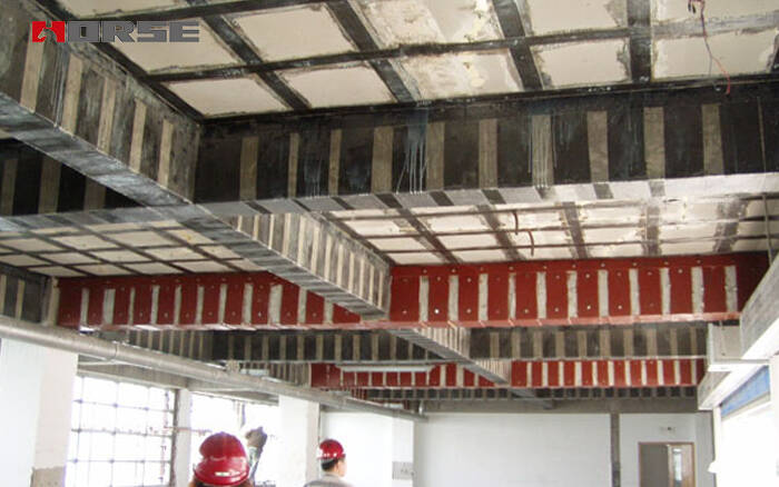 усиленный приклеенной стальной пластиной