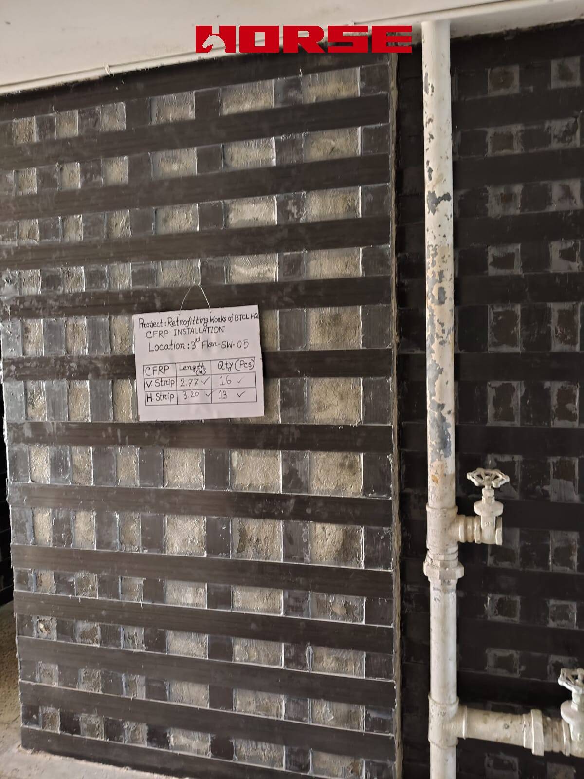 CFRP Plate Strengthening for Concrete Load-Bearing Walls