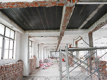 Rénovation d'un immeuble administratif par collage adhésif