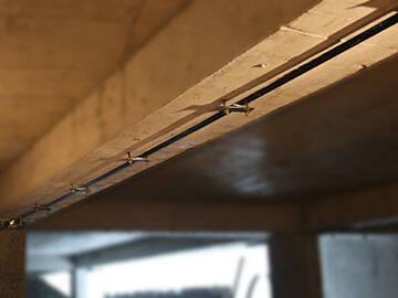 Железобетонные балки, усиленные ламинатом из углепластика и листами из углепластика